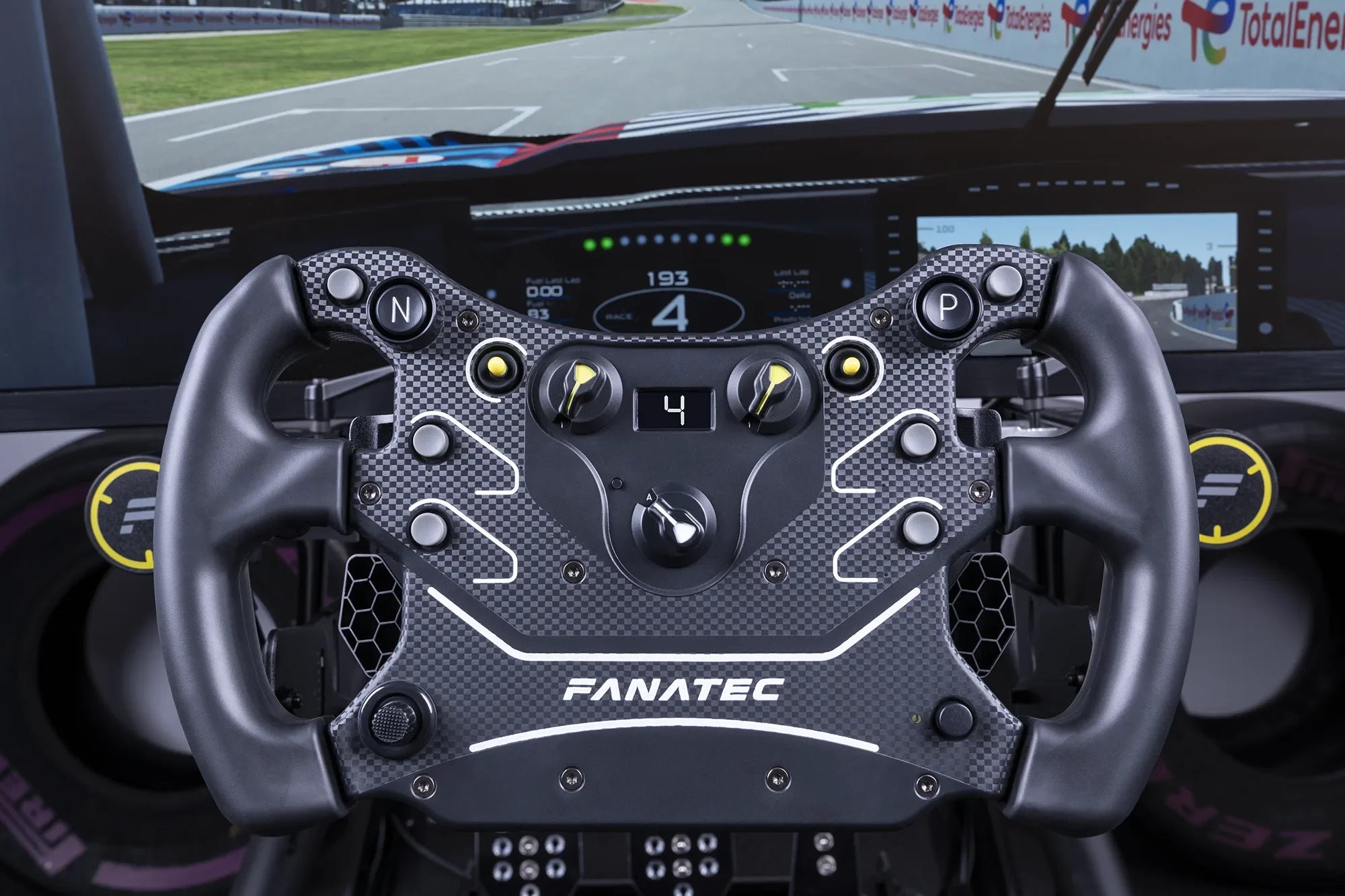 Fanatec ClubSport DD direct drive wheelbase with steering wheel mounted — sim racing hardware included in Turnkey racing simulator packages