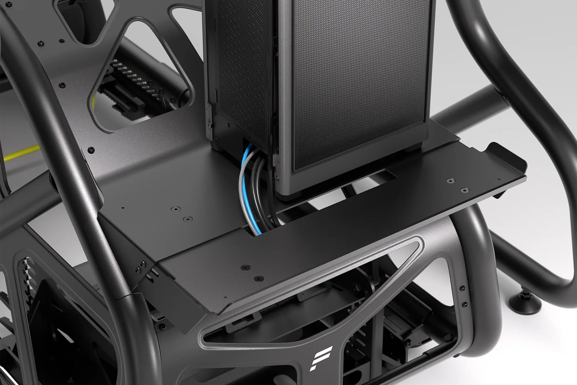 PC tray mounted on Fanatec ClubSport GT cockpit — keeps gaming computer accessible within the racing simulator setup